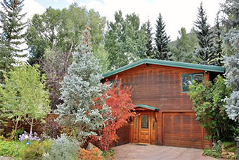 east side cozy cottage 2 bedroom cabin in aspen colorado by Aspen Signature Properties
